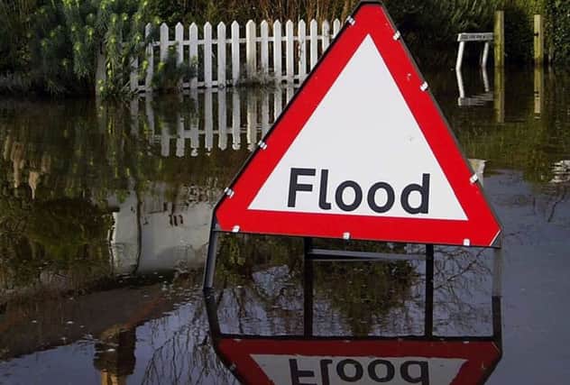The downpours could lead to flooding in parts of the West Highlands. Picture: Getty