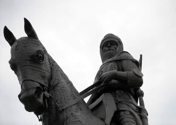 A carving of Robert the Bruce, which was thought to have been centuries-old, was actually made in the late 1960s. Picture: John Devlin