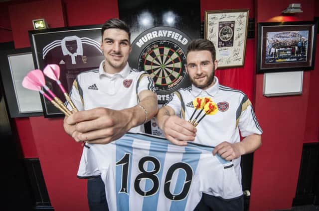 James Keatings, left, and Callum Paterson at the Murrayfield Sports Bar to promote a Tynecastle darts night. Picture: Phil Wilkinson