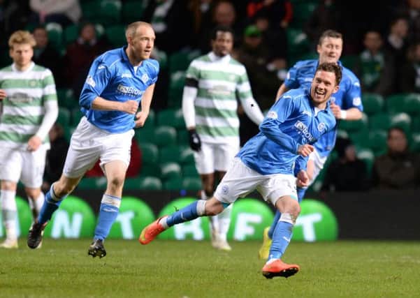 Danny Swanson wheels away in delight having fired a 25 yard shot into the top corner to open the scoring for St Johnstone. Picture: SNS