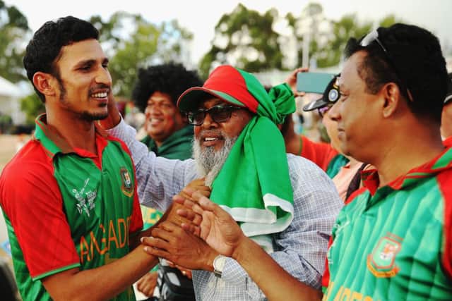 Nasir Hossain celebrates with fans after the match. Picture: Getty