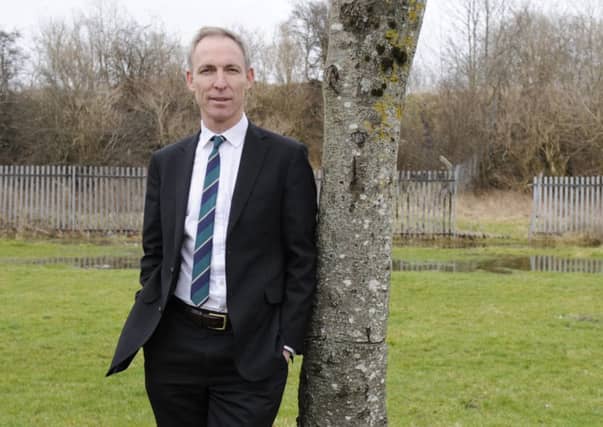 Murphy believes reading can expand children's horizons. Picture: John Devlin