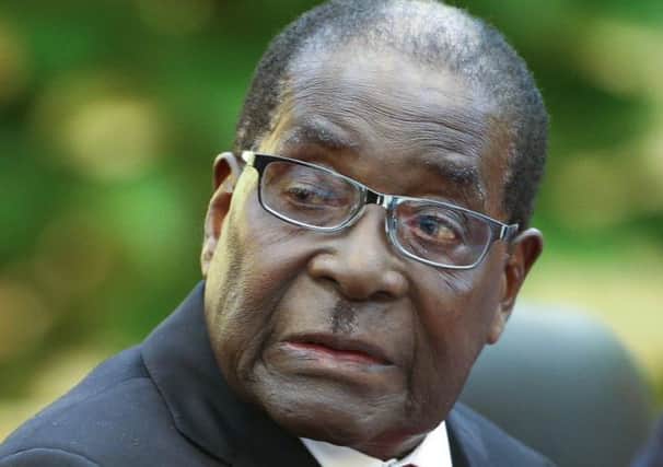 Robert Mugabe earns £7,900 a month - normal workers £200. Picture: Getty