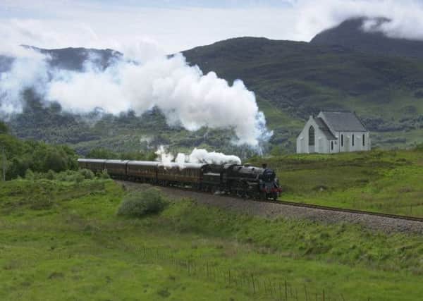 A train on the West Highland line at Loch Awe, one of the special scenic routes. Picture: Ron Jessop