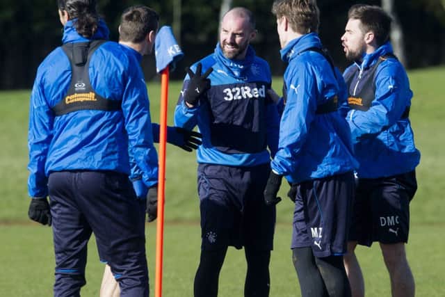 Kris Boyd, centre, has been backed by Rangers manager Kenny McDowall. Picture: SNS