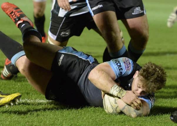 Glasgow Warriors' Kevin Bryce scores his side's third try of the match. Picture: SNS