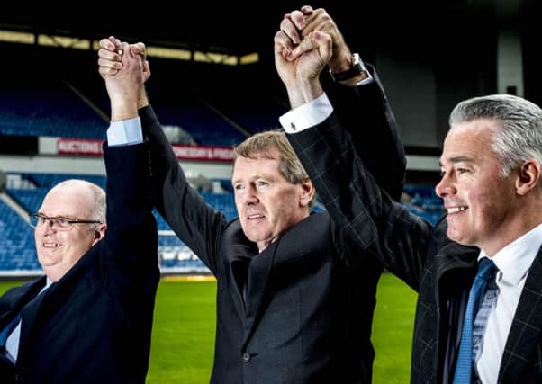 Dave King celebrates success at the club's EGM alongside John Gilligan (left) and Paul Murray (right). Picture: SNS Group