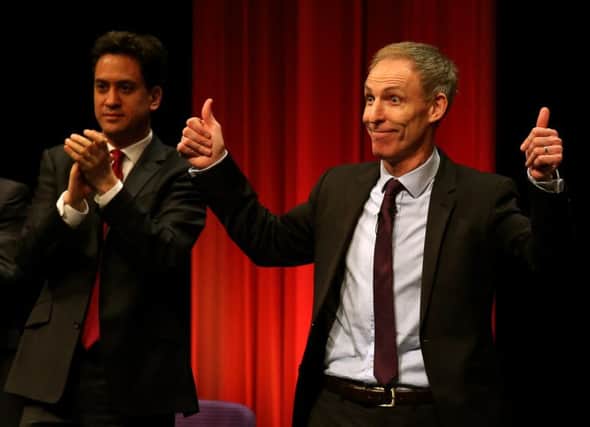 Scottish Labour leader Jim Murphy  is applauded by Labour leader Ed Miliband. Picture: PA