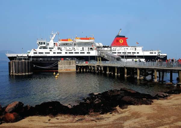 CalMac's Caledonian Isles docks at Brodick. Picture: Ian Rutherford