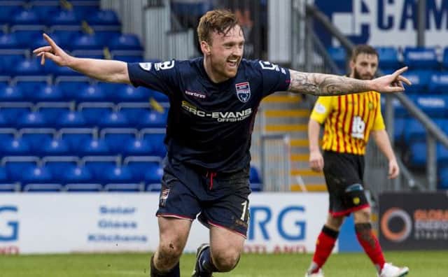 Ross County ace Craig Curran celebrates what turned out to be the winning goal. Picture: SNS