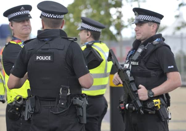 Senior officers will appear before MSPs to give evidence on the deployment of armed police. Picture: Ian Rutherford