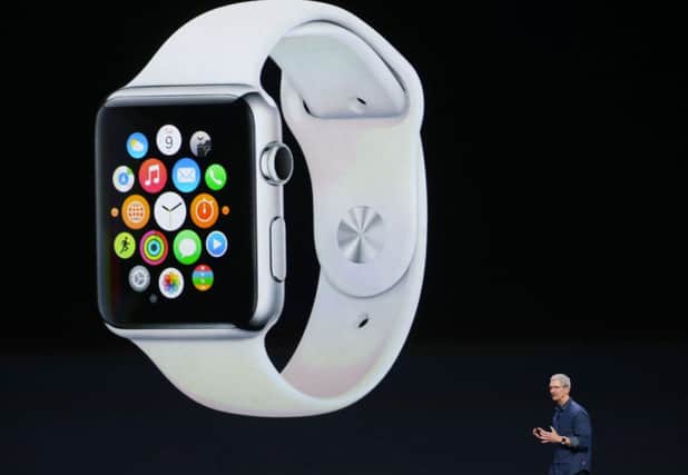 Apple CEO Tim Cook  is due to reveal the price and launch date of the wearable technology later today. Picture: Getty