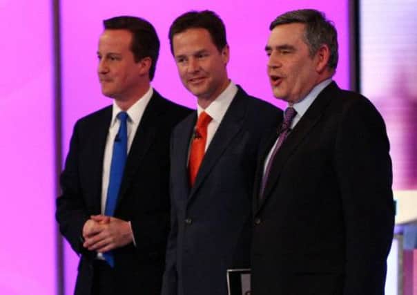 David Cameron, Nick Clegg and Gordon Brown after live 2010 televised debate. Picture: AFP