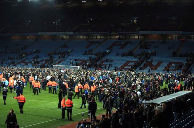 Hundreds of Aston Villa fans invaded the pitch after their FA Cup sixthround win. Picture: PA