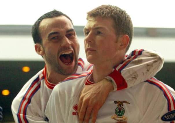 Bryan Prunty, right, after scoring Inverness' first-ever goal at Ibrox in 2005. Picture: Robert Perry