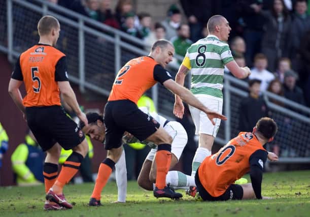 Butcher (right) involved in the tussle for which Paul Paton was punished. Picture: PA