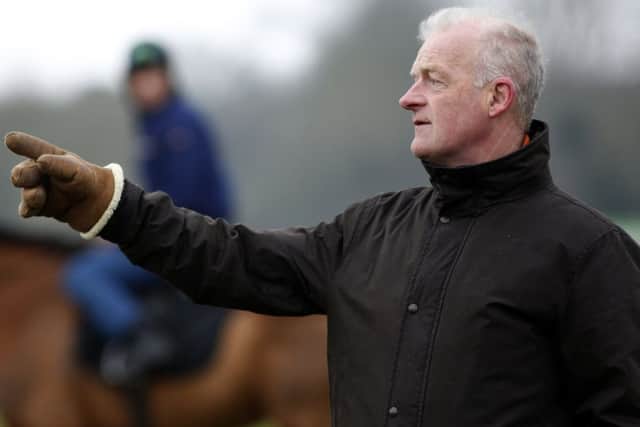 Willie Mullins points the way as he finalises preparations at Cheltenham. Picture: Getty