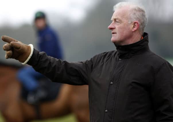 Willie Mullins points the way as he finalises preparations at Cheltenham. Picture: Getty