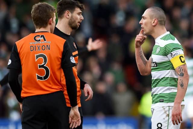 Scott Brown squares up to Nadir Ciftci after the two tussled on the deck. Picture: SNS
