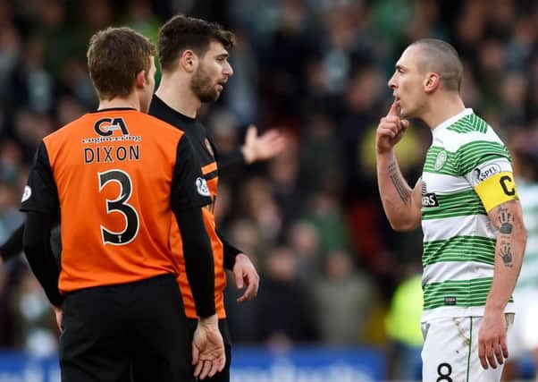 Scott Brown squares up to Nadir Ciftci after the two tussled on the deck. Picture: SNS
