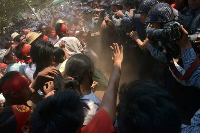 Protests by students objecting to new education laws in Burma were ended by riot police. Picture: Getty