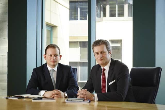 Simon Thomson, right, said Cairn was in a good position to take advantage of lower oil prices