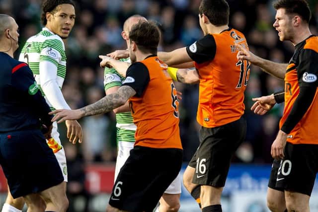 Handbags at Tannadice saw Virgil van Dijk and Paul Paton sent off. Picture: SNS