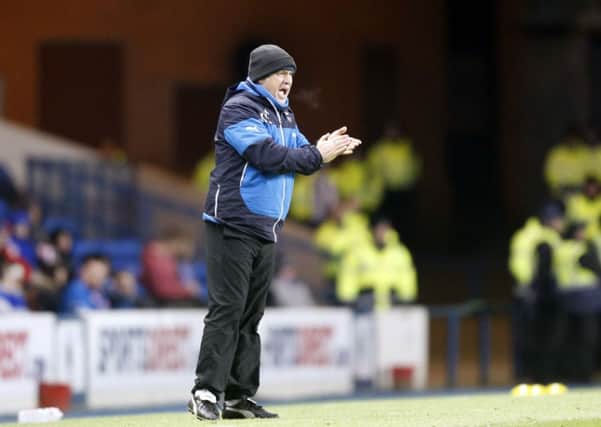 Kenny McDowall shouts instructions from the touchline. Picture: PA