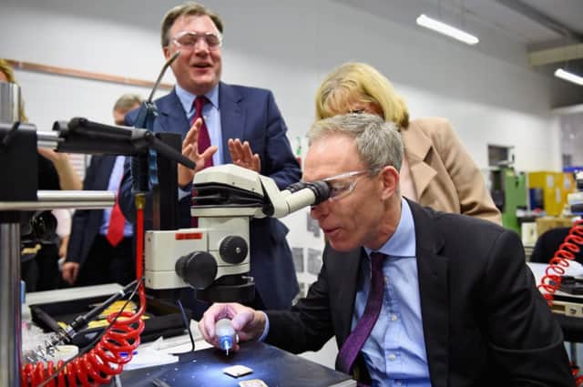 Ed Balls and Jim Murphy during a visit to Walker Precision Engineering's plant in Glasgow. Picture: Getty