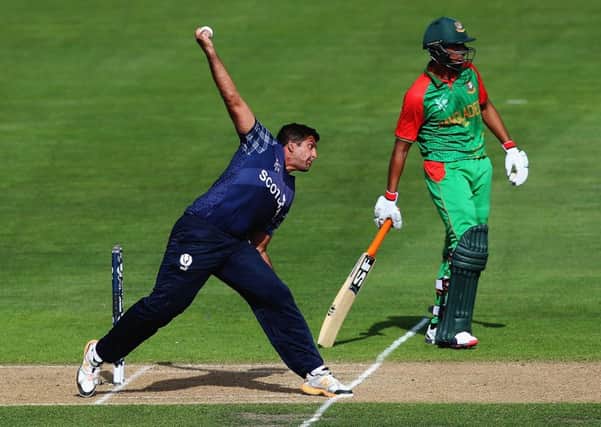 Majid Haq of Scotland bowls during the 2015 ICC Cricket World Cup match between Bangladesh and Scotland. Picture: Getty