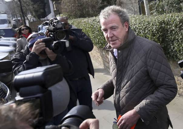 Jeremy Clarkson leaves his home in London, as he laughed off his latest controversy telling reporters he was 'just off to the job centre'. Picture: PA