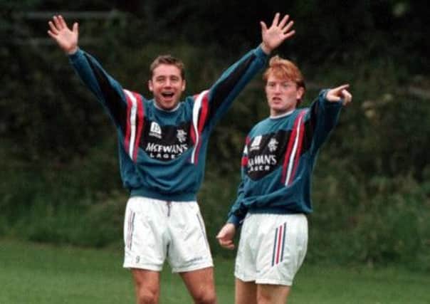 Former Rangers manager Ally McCoist, left, currently on 'gardening leave' and new man Stuart McCall in training. Picture: SNS