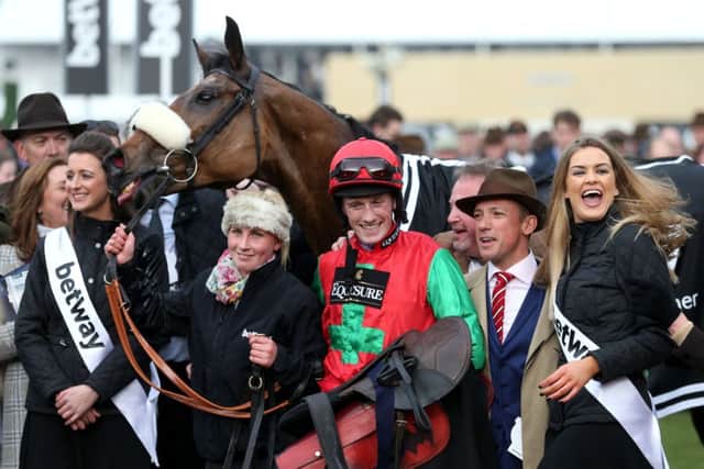 Sam TwistonDavies with Dodging Bullets, along with the Frankie Dettori. Picture: PA