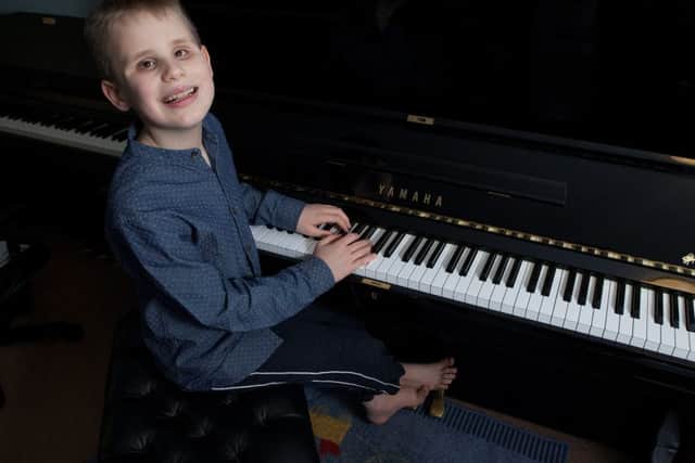 Ethan Loch from Dennyloanhead, near Falkirk, who is completely blind and a master on the piano. Picture: Hemedia
