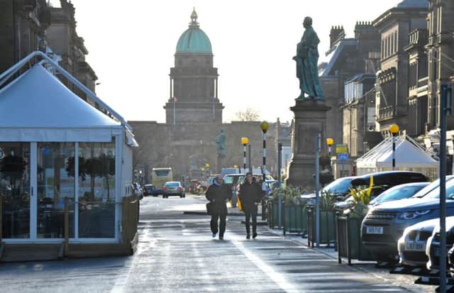 Pedestrians on the traffic-free sections of George Street, Edinburgh. Picture: Jane Barlow