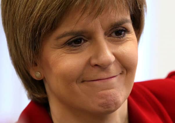 Sturgeon has called on Labour to outline their plans for Scottish cuts. Picture: PA