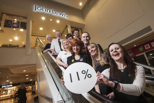 These John Lewis staff seem happy with a 11% bonus. Picture: John Wilkinson