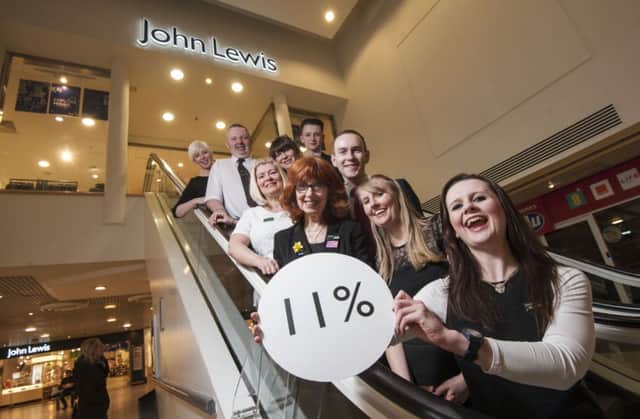 These John Lewis staff seem happy with a 11% bonus. Picture: John Wilkinson