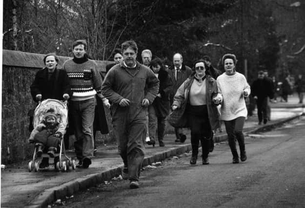 Parents rush to a Dunblane primary school on hearing that Thomas Hamilton had shot dead 16 children. Picture: Allan Milligan