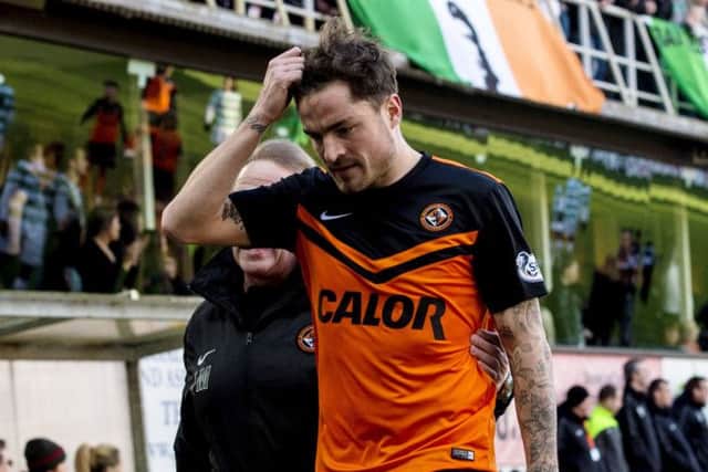Paul Paton leaves the field after being wrongly sent off at Tannadice. Picture: SNS