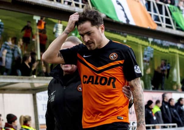 Paul Paton leaves the field after being wrongly sent off at Tannadice. Picture: SNS