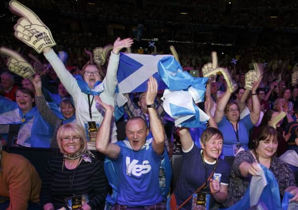 Yes supporters show their enthusiasm at an SNP rally in Glasgow. Picture: Robert Perry