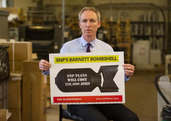 Jim Murphy unveils a new poster aimed at boosting support for Scottish Labour. Picture: John Devlin
