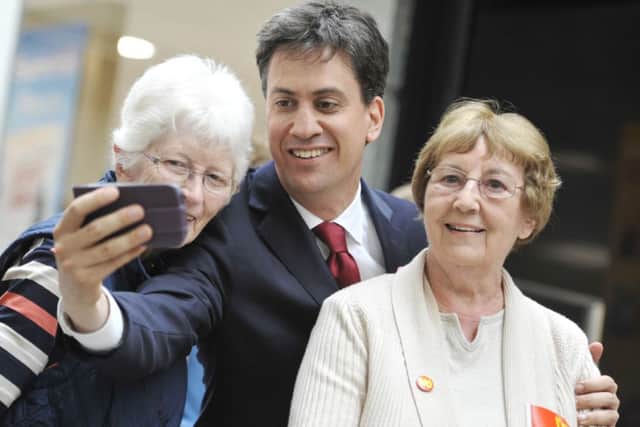 Ed Miliband takes a selfie with two shoppers. Picture: Phil Wilkinson