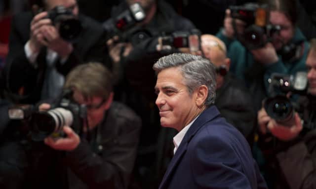 George Clooney will visit Edinburgh to support Social Bite. Picture: Getty