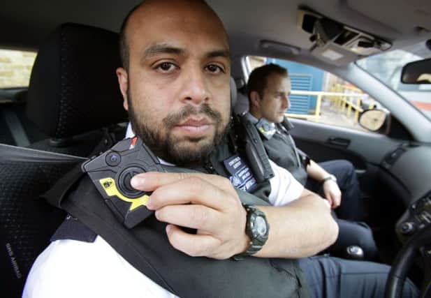 Police officers across London are wearing video cameras when responding to emergency calls. Picture: Getty