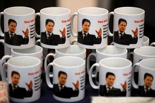 Nick Clegg mugs lined up for sale at the party conference venue in Liverpool. Picture: Getty