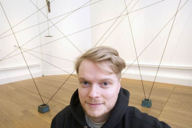 Ben Martin, pictured here with his work, Line and Weight, at the RSA Contemporaries Exhibition. Picture: Ian Rutherford