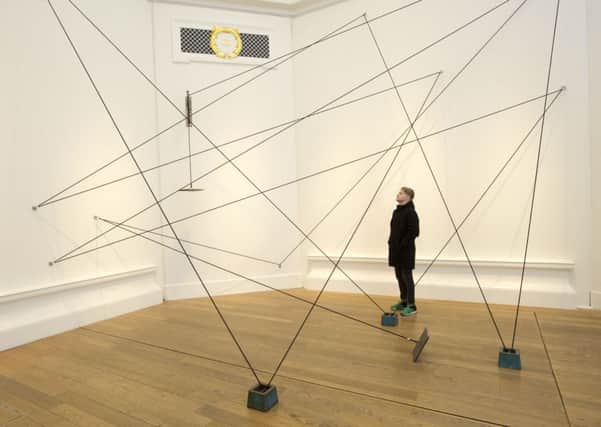 Ben Martin, pictured here with his work, Line and Weight, at the RSA Contemporaries Exhibition. Picture: Ian Rutherford