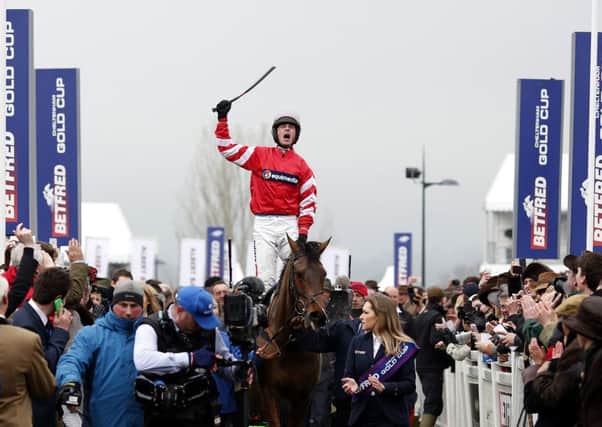 Nico de Boinville rides Coneygree into the winner's enclosure after victory. Picture: Getty